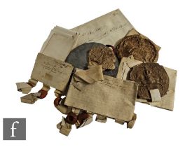 A small collection of early 17th Century indentures and transcripts and a later indenture with