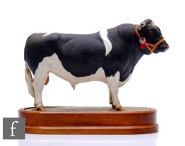 A Royal Worcester model of a British Friesian Bull, modelled by Doris Lindner, circa 1964, printed