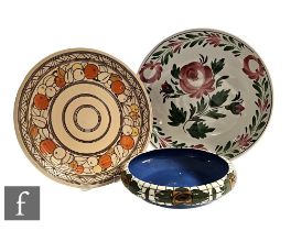 A 1930s Art Deco Charlotte Rhead for Crown Ducal charger, decorated in the Fruit Border pattern,