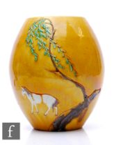 A Chinese Sancai glazed ovoid form vase, relief moulded with horse before a willow tree, before a