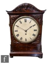 A 19th Century William IV mahogany bracket clock, single fusee movement circular dial within a brass