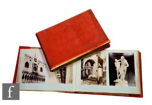 Two large vellum bound photograph albums, circa 1900, containing monochrome photographs depicting