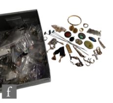 A large collection of costume jewellery to include necklaces, earrings, brooches, cufflinks etc. (