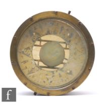 An early 20th Century brass cased ships gimbal compass, with screw down bezel and painted dial,