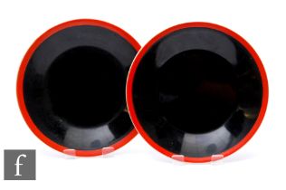 A pair of Clarice Cliff Yoo-Hoo side plates circa 1930, each with a red enamel band over black