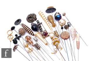 A collection of various hatpins to include faux pearl, beadwork and sequin examples. (54)