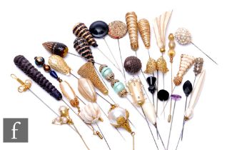 A collection of various hat pins to include sequin, gilt metal and faux pearl examples. (43)