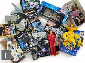 A collection of assorted sci-fi and space related toys and merchandise, to include Tron, Robocop,