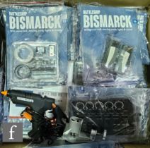 A collection of Hachette Battleship Bismarck partwork magazines with all pieces, to build a 1:200