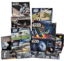 Thirteen assorted Star Wars plastic model kits by AMT / ERTL, Airfix and Revell, all boxed. (13)