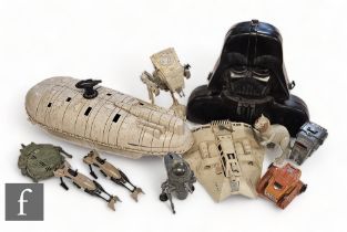 A collection of vintage Kenner Star Wars vehicles and other toys, comprising Rebel Transport, X-
