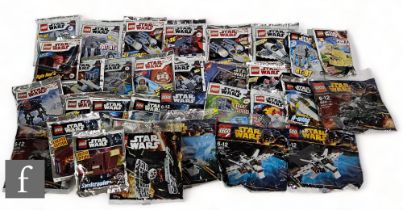 A collection of Lego Star Wars mini building sets, to include 912287 Mandalorian Starfighter, 912282