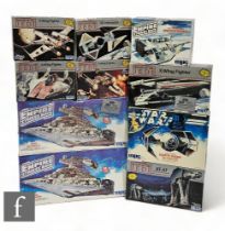 A collection of MPC / ERTL Star Wars plastic model kits, comprising two Star Destroyers, Darth