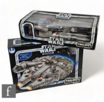 Two Hasbro Star Wars Original Trilogy Collection vehicles to include a Millennium Falcon and a Y-