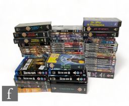 A collection of assorted Doctor Who VHS tapes and DVDs. (qty)