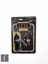 A Palitoy Star Wars Return of the Jedi Darth Vader 3 3/4 inch action figure, sealed on a 65 back