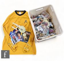 A Captain Kirk Star Trek cosplay shirt, size XL, together with an assorted collection of Star Trek
