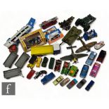 An assorted collection of mostly unboxed diecast models, to include military vehicles, sportscars,