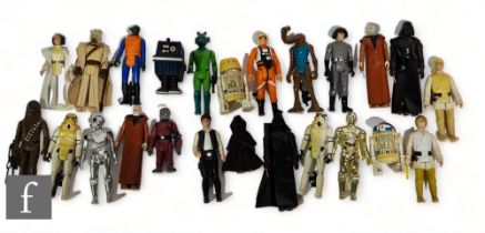 A collection of Kenner Star Wars action figures, most complete with accessories. (24)