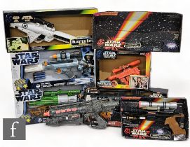 A collection of Hasbro Star Wars rifles and blasters, to include Episode I Naboo Pistol, Power of