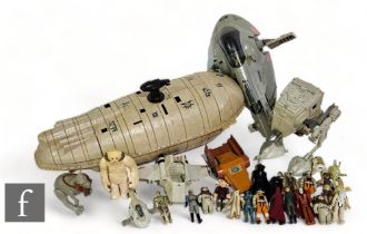 A collection of vintage Kenner Star Wars toys, to include Slave I, Rebel Transport, AT-ST, Wampa,