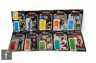 A collection of vintage Star Wars Return of the Jedi backing cards for action figures, mostly Kenner