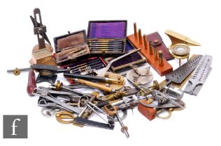 A large assortment of 19th and early 20th Century watch maker's tools, to include callipers,
