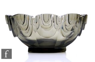 A 1930s Art Deco Moser glass bowl of footed oval section cut with repeat stepped semi-circular