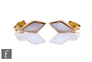 A pair of 9ct hallmarked mother of pearl stud earrings of elongated triangular form, weight 2.5g.