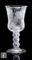 A 19th Century goblet, the large waisted bell form bowl engraved with a fruiting vine above a triple