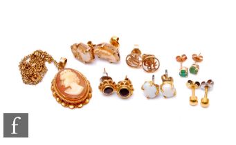 A 9ct cameo pendant and chain with six pairs of 9ct stone set stud earrings to include opal and