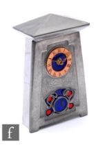 An Arts & Crafts Liberty style pewter mantel clock, blue and red enamel detail, battery operated,