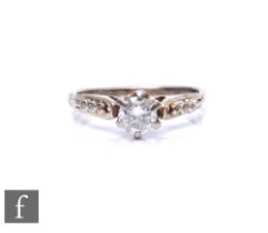 An 18ct white gold diamond solitaire ring, claw set brilliant cut stones, weight approximately 0.