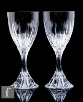 A set of eight contemporary Christofle clear cut crystal wine glasses in the Cathedrale pattern with