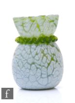 A 19th Century crackle glass vase of ovoid form with flared frill rim, the green body with opal