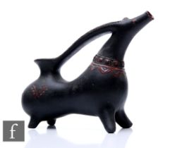A stoneware zoomorphic jug of elongated form, raised to four pulled feet with stylised animal