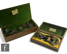 Two Turner type 600 leather gauges, each in a fitted wooden case. (2)