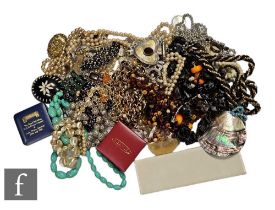 A parcel lot of assorted costume and other jewellery to include beads, brooches, cufflinks, pendants