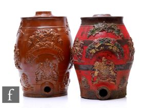 A pair of 19th Century Brampton type brown salt glazed stoneware spirit barrels, decorated with