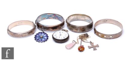 Four hallmarked silver bangles with three pendants, a Mexican brooch and a fob watch, damaged. (9)