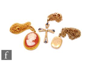 Three 9ct pendants and chains to include a cross and a cameo example, total weight 12.5g. (3)