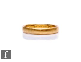 A 22ct D shaped wedding ring, weight 3.3g, ring size l 1/2, misshaped.