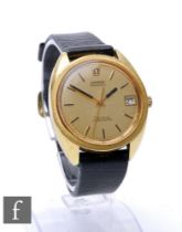 A gentleman's gold plated Omega Megasonic quartz wrist watch with batons and date facility to a