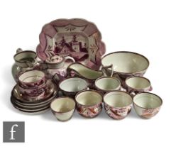 A collection of mid 19th Century Sunderland lustre tea and tablewares to include bread and butter