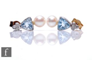 A pair of 9ct hallmarked aquamarine, diamond and cultured pearl stud earrings each with central