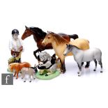 A collection of Porcelain horse figures, to include three Beswick, a Royal Doulton Thelwell
