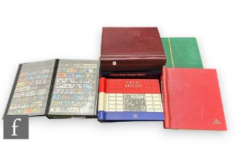 A British stamp collection in nine albums, definitive and commemorative issues, franked and mint. (