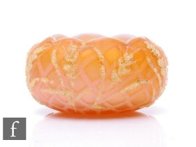 A late 19th Century Stourbridge glass air trap salt bowl, internally decorated with an amber to pink