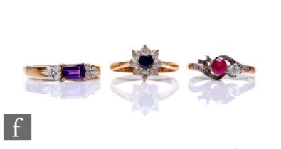 Three 9ct hallmarked stone set rings to include amethyst and paste examples, total weight 7.8g,