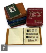 A world stamp album to include Netherlands, Italy, Congo, Liberia, Isle of Man, Caribbean Islands